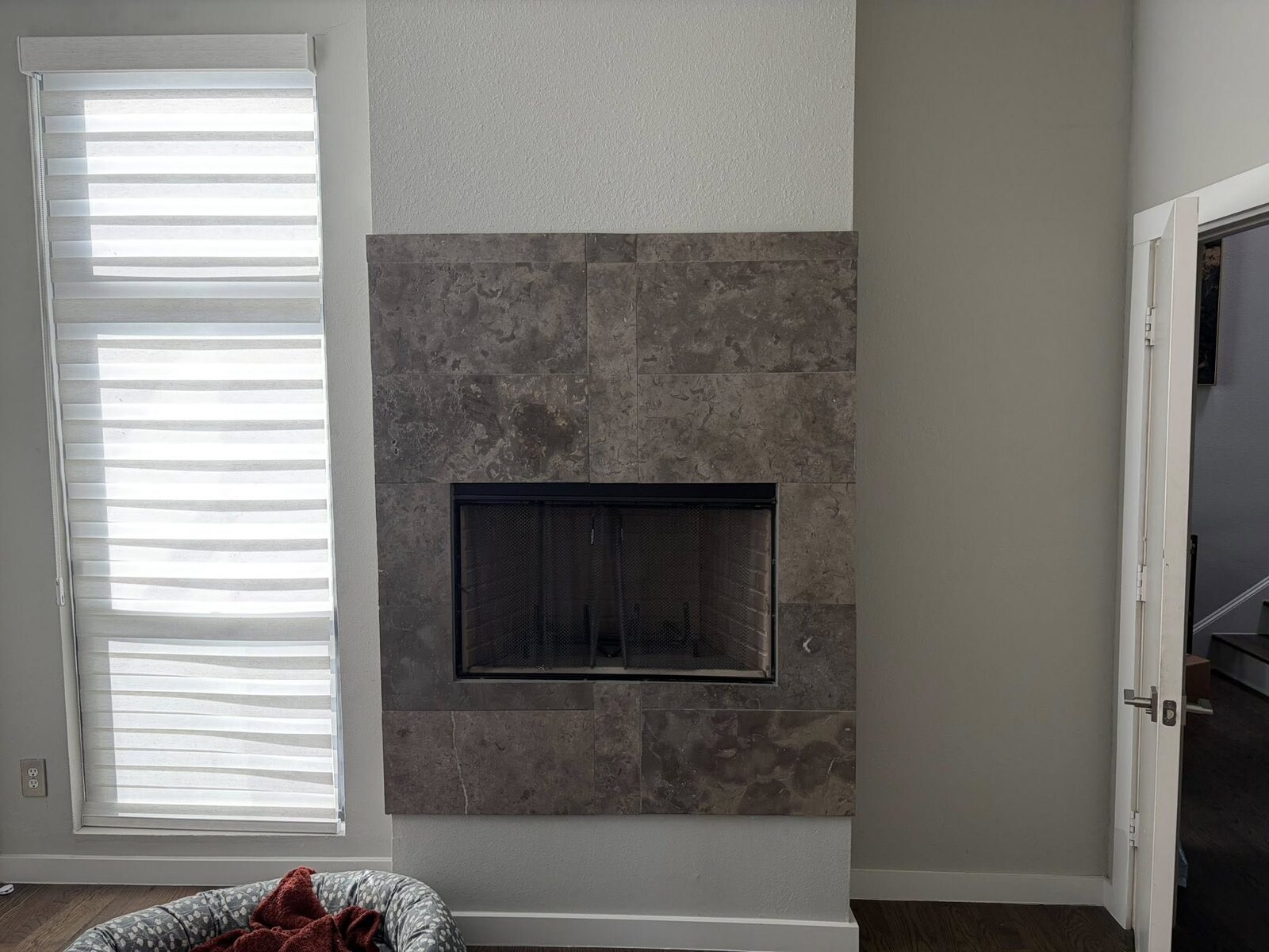 Travertine tile fireplace feature wall