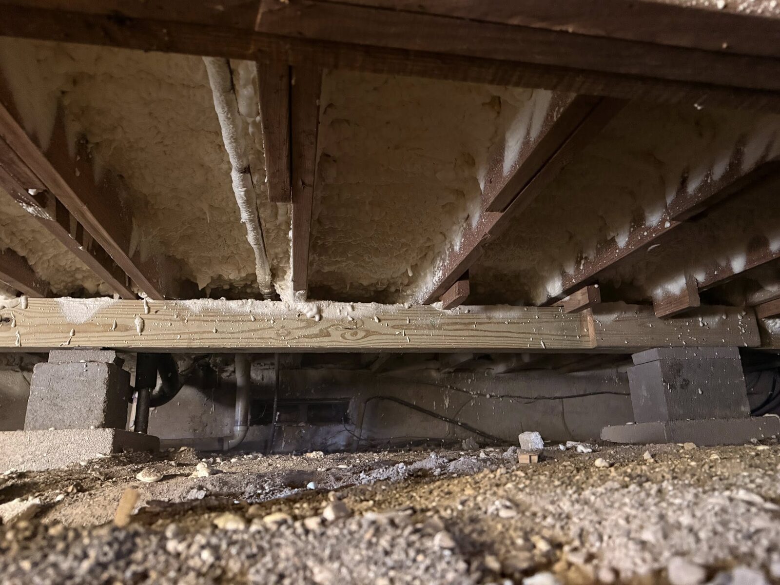 Bare, unsealed crawlspace before insulation