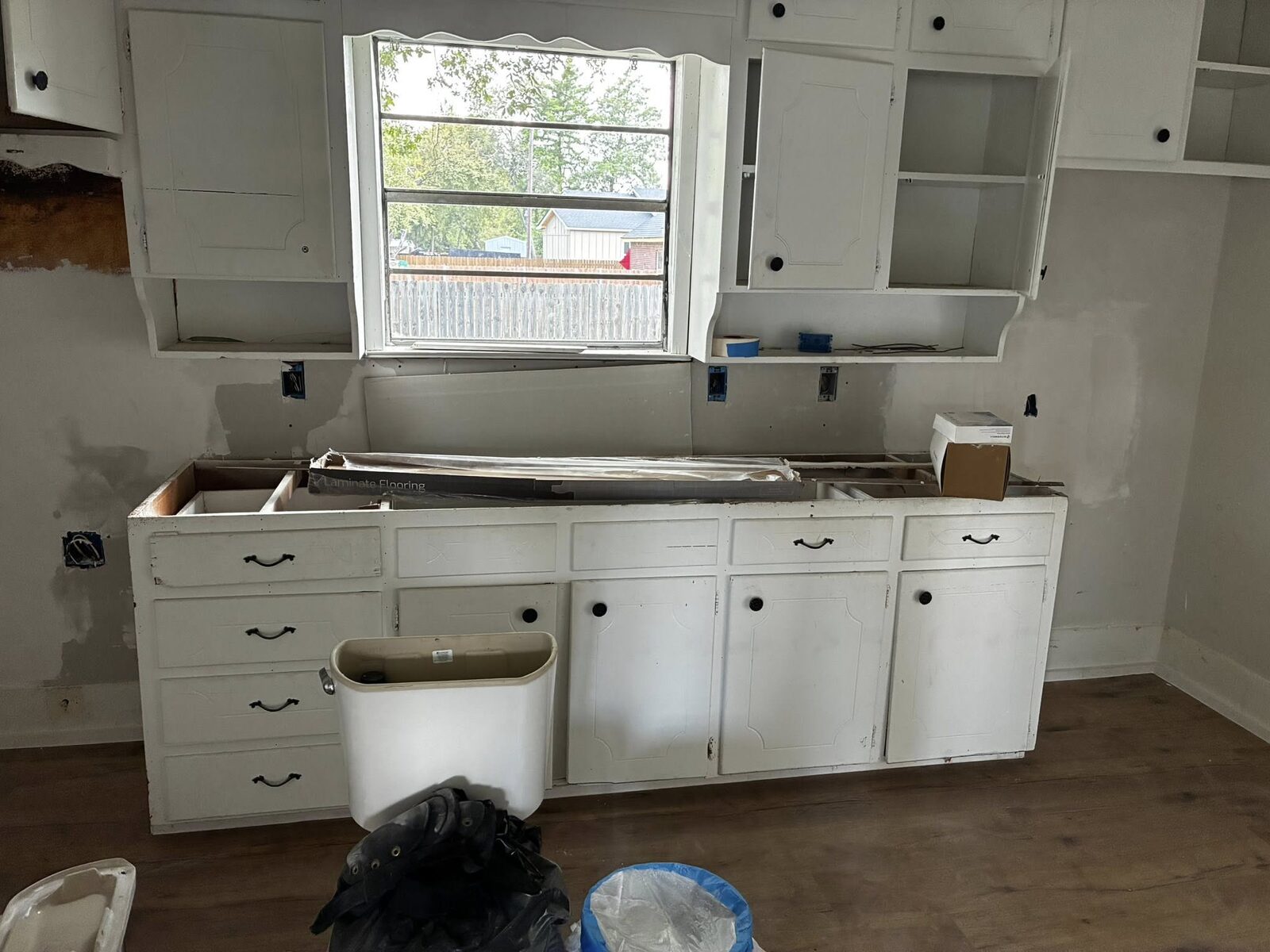 Kitchen mid-renovation, cabinets removed